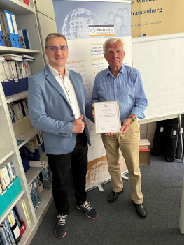 Mariusz Rzeznikiewicz und Prof. Dr. Hans Richter, Vorstandsvorsitzender des GFWW e. V.